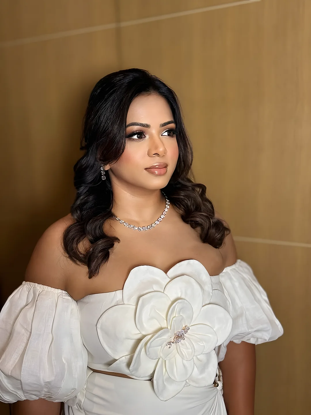 Glam with a white sculptural top
